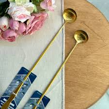 تصویر از قاشق پارچ طلایی