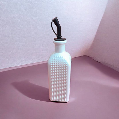 تصویر از روغن ریز سفیدومشکی